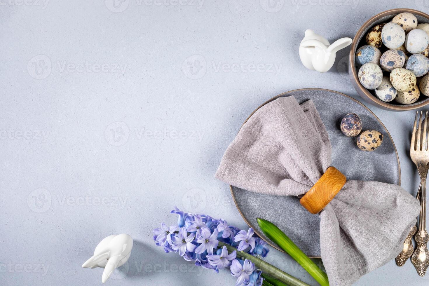 Stylish Easter table serving for cafes and restaurants in gray Top view Horizontal format Copy space photo