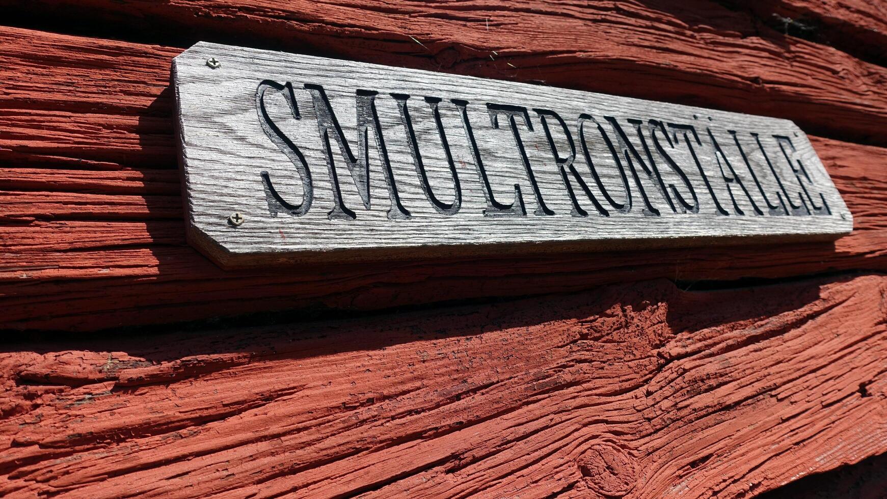 a sign in Scandinavia indicating a place of the Wild Strawberries photo