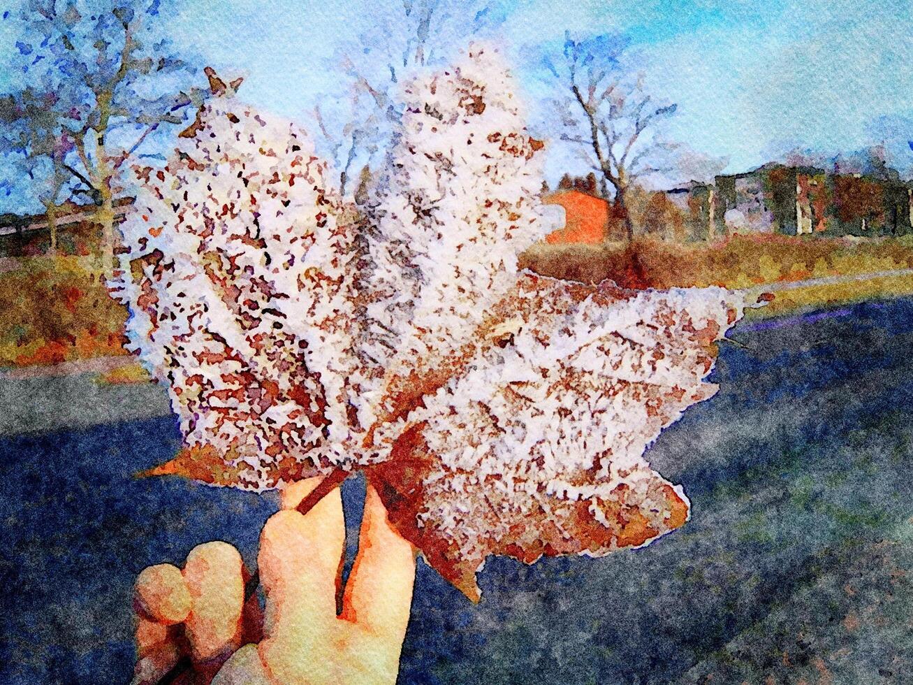 digital acuarela estilo de un mano participación un hoja cubierto en nieve cristales foto