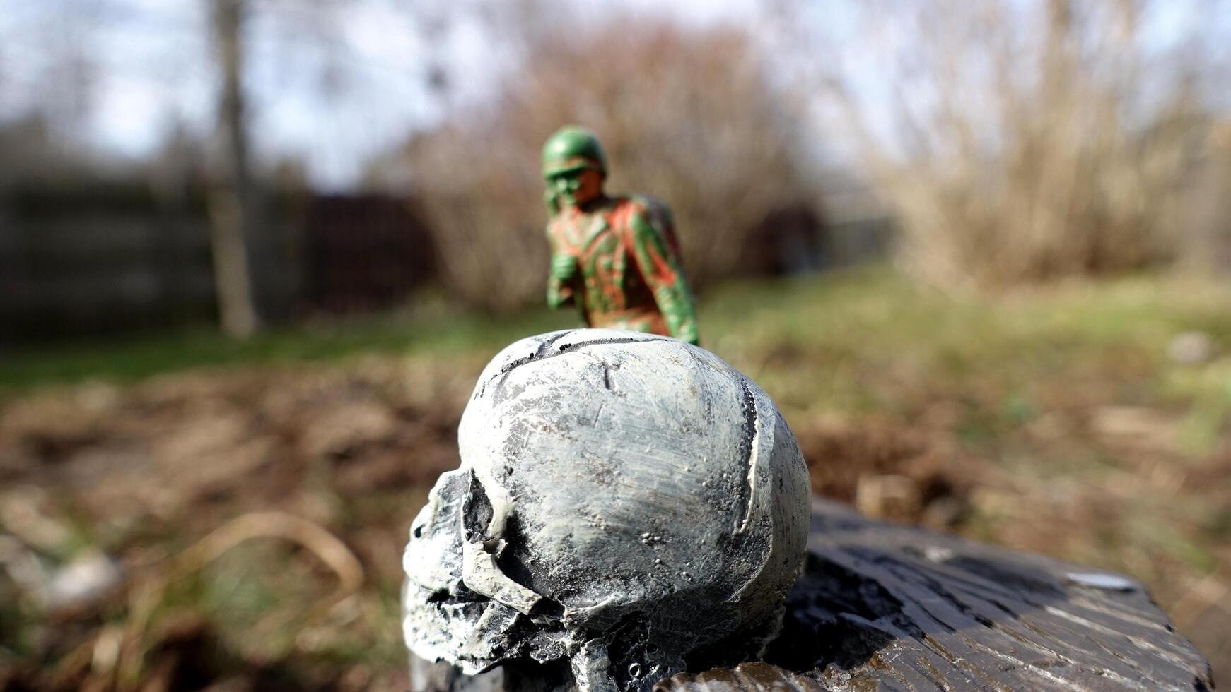 A soldier in war always walks with, together and towards death photo