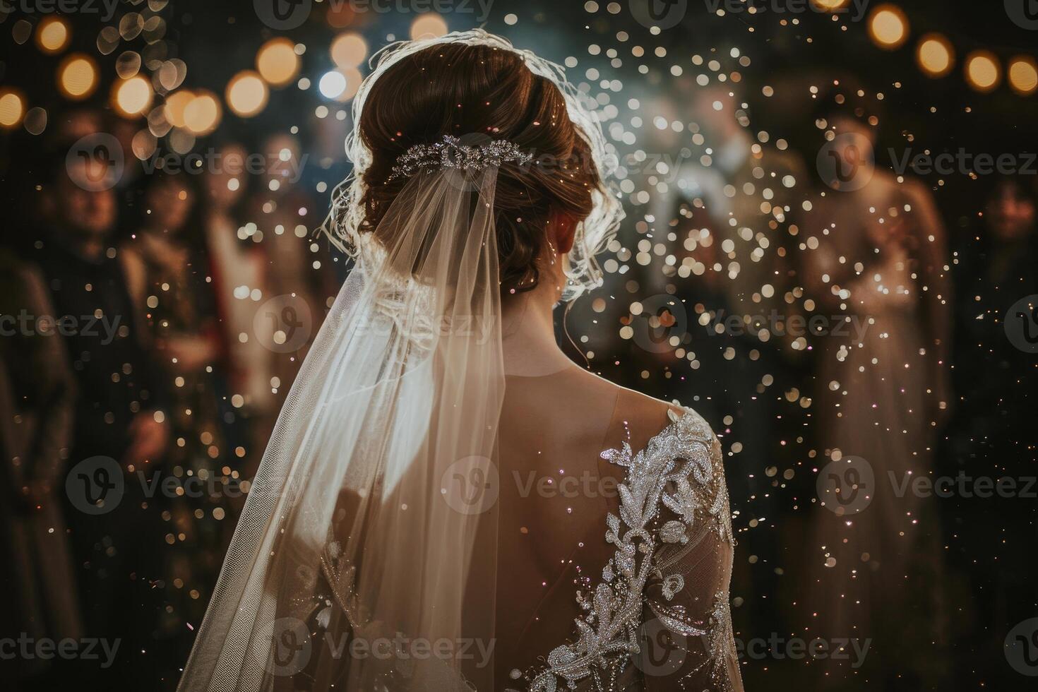 Wedding celebration. The bride girl is in the foreground among the other guests. Mysterious atmosphere. Back view photo