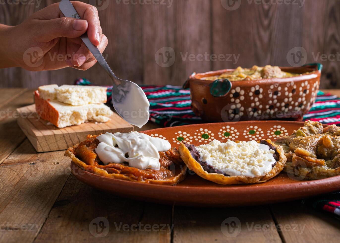 Sopes of chicharron in green sauce and red sauce. Mexican food. photo