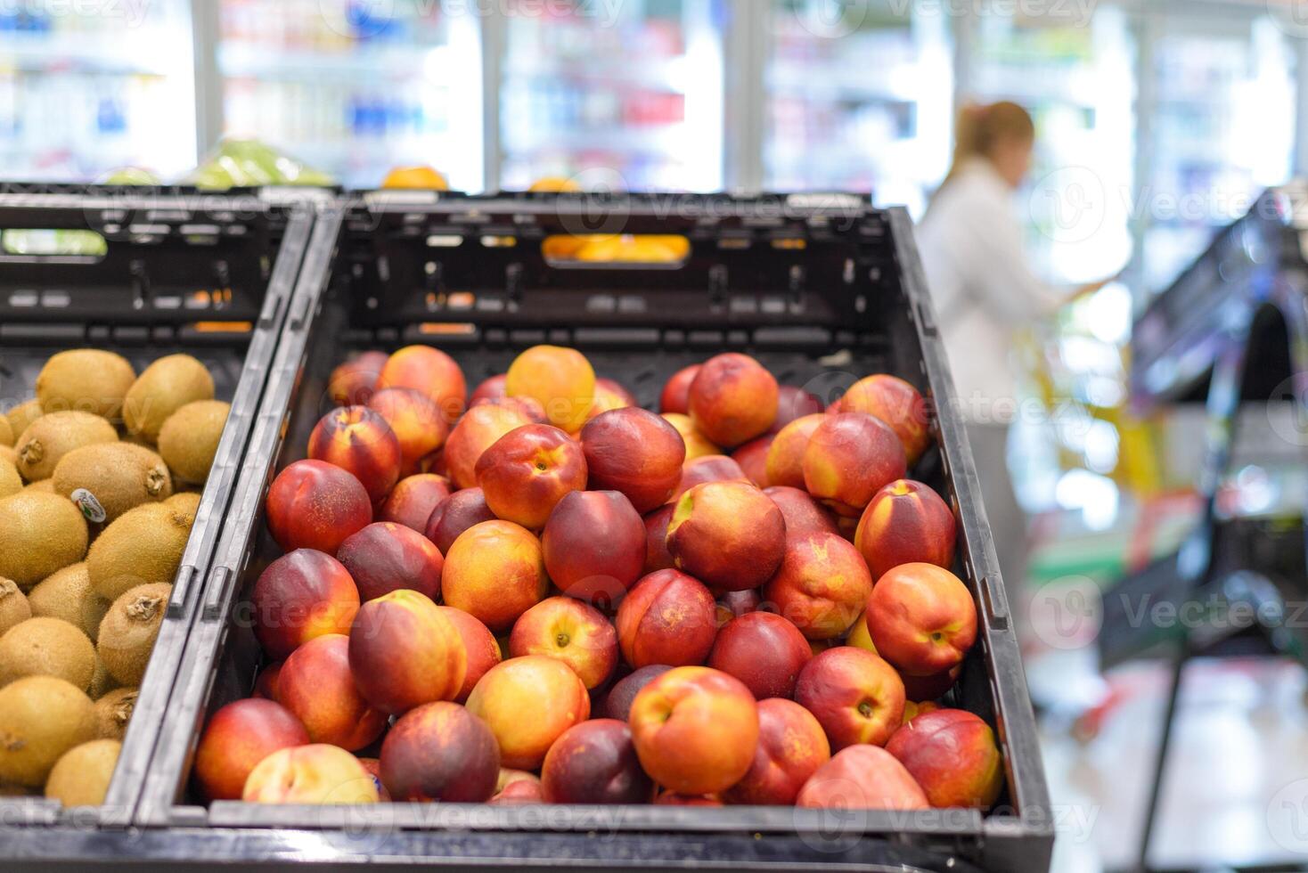Nectarine stand in a supermarket. photo