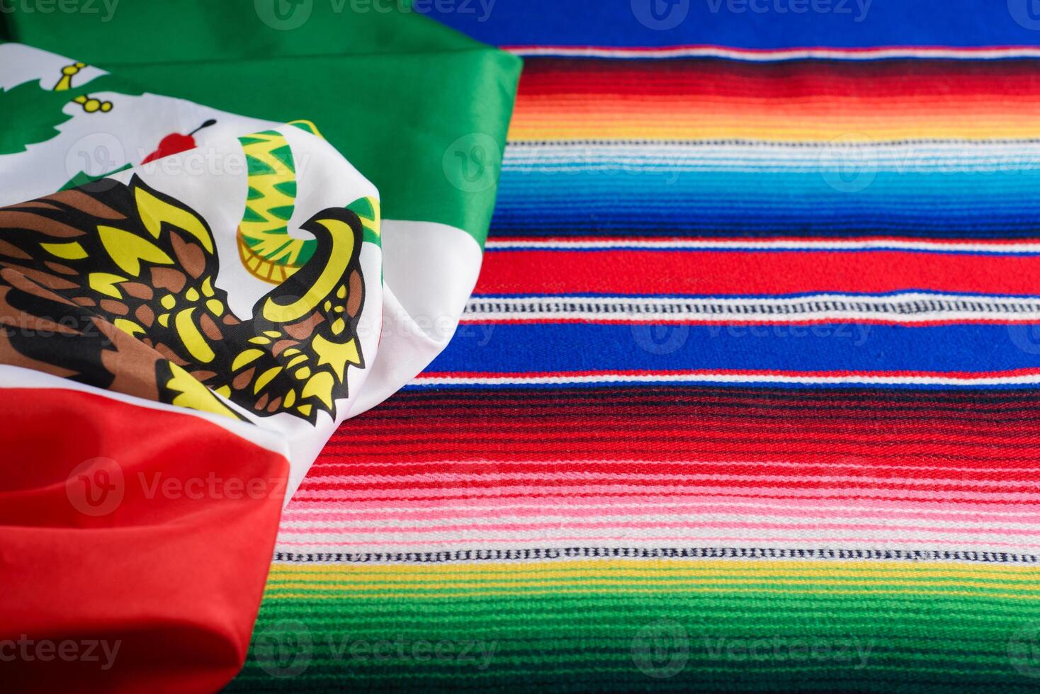 Serape and Mexican flag. Cinco de Mayo background. photo