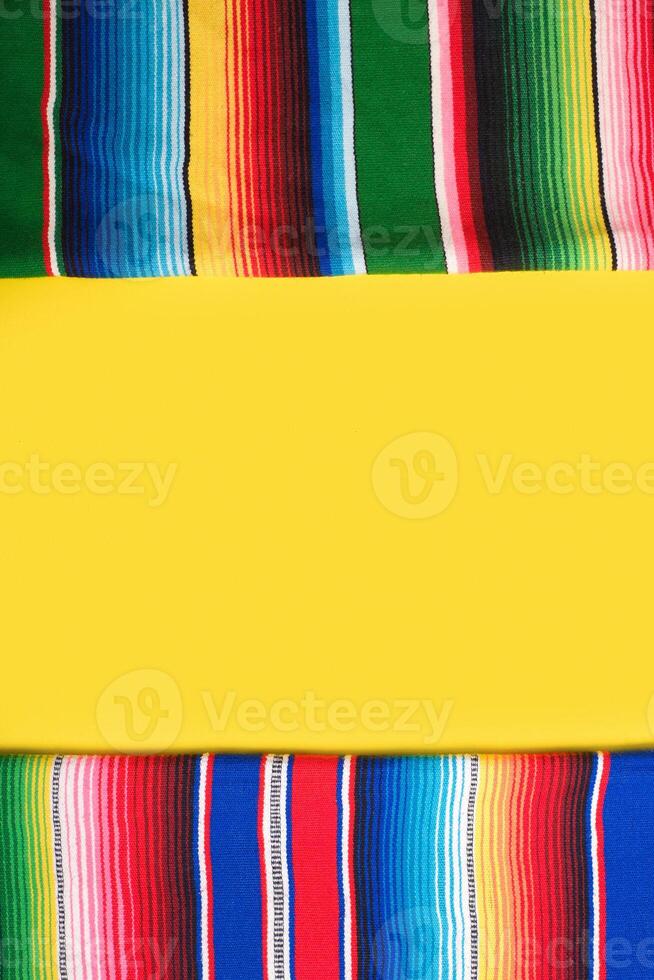 Serape on yellow background. Cinco de mayo background. photo