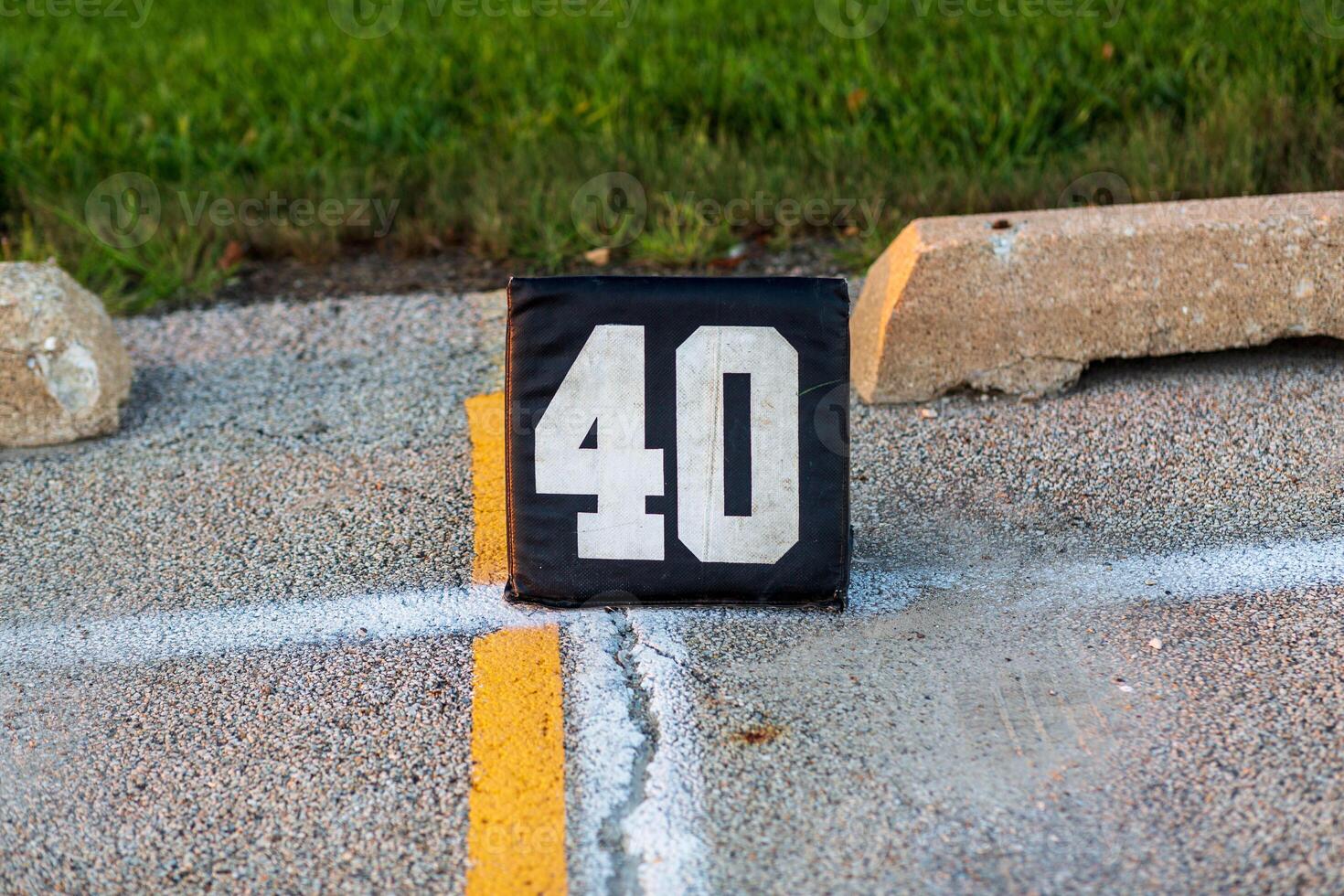 the forty yard line marker ready for a marching band rehearsal photo