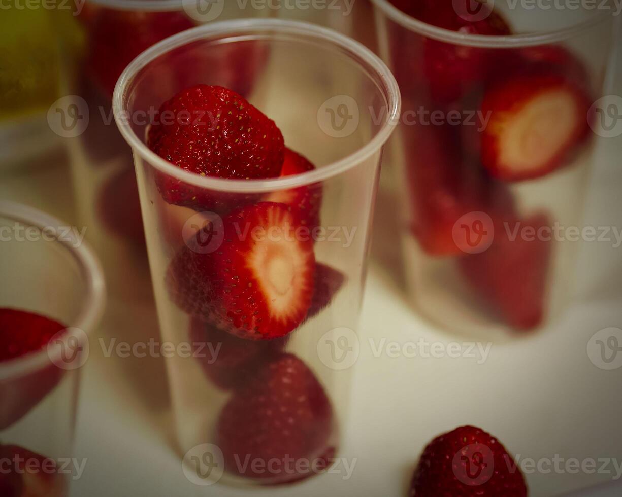 glasses of fresh strawberries ready for band camp fruit break photo