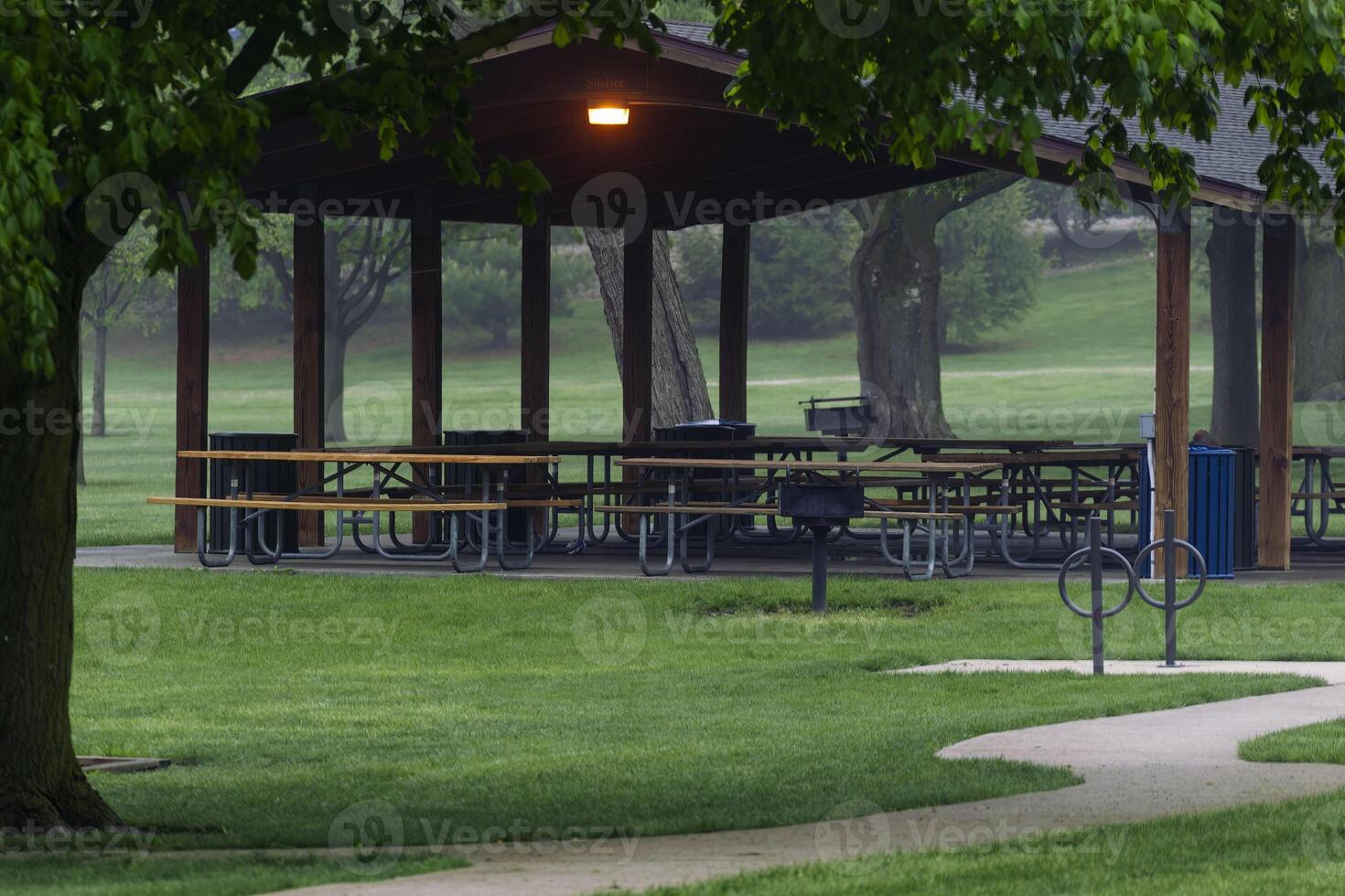 picnic tables in a pavilion are common gathering places all year round photo
