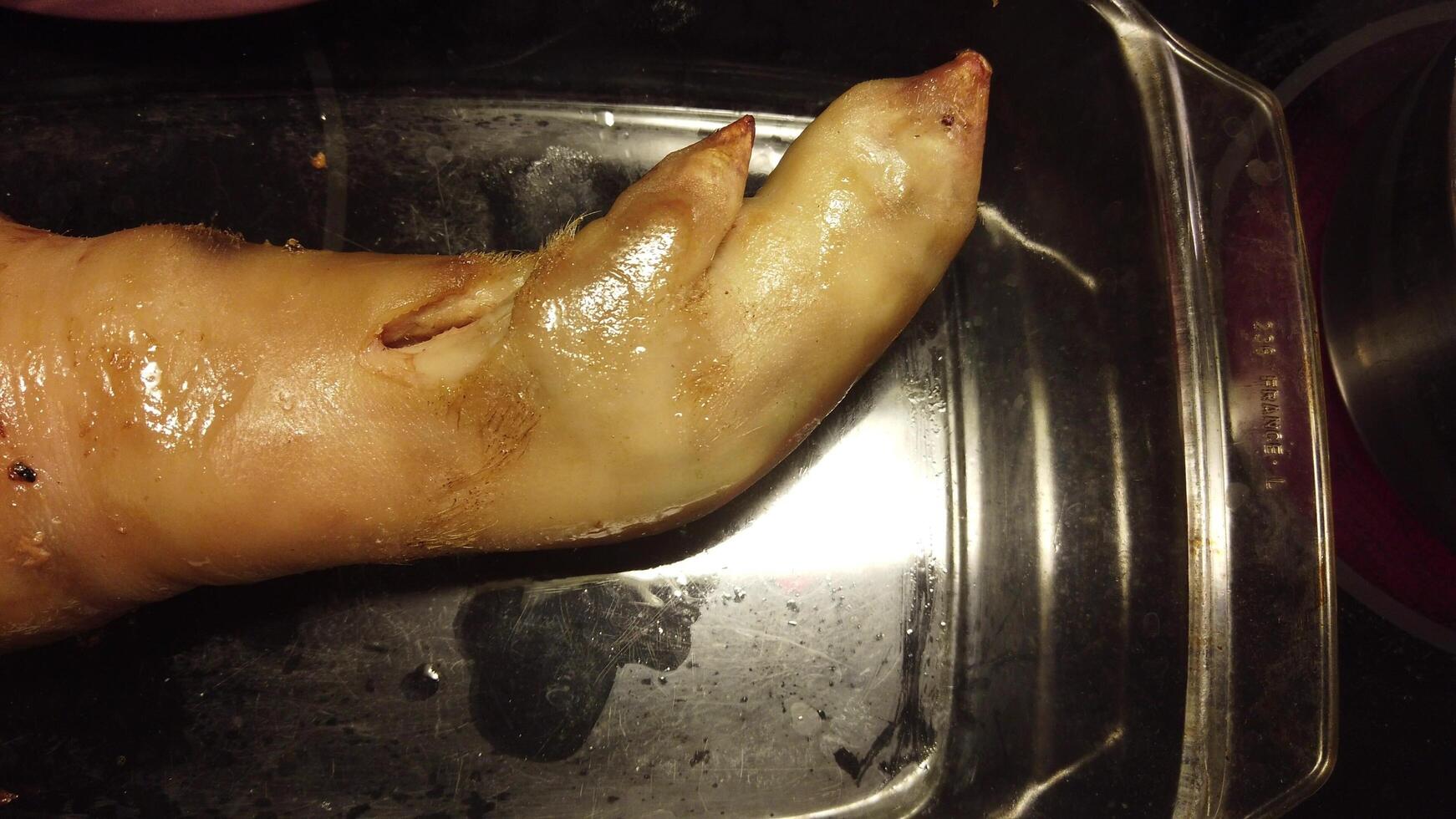 video of a stuffed pork leg just out of the oven and ready to be served photo