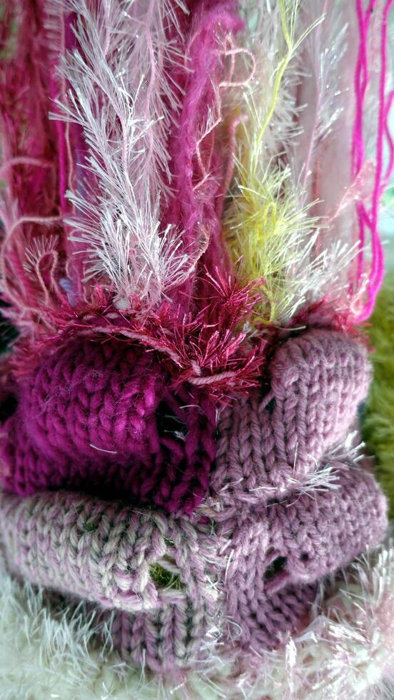 knots and frays of colored wool and cotton photo