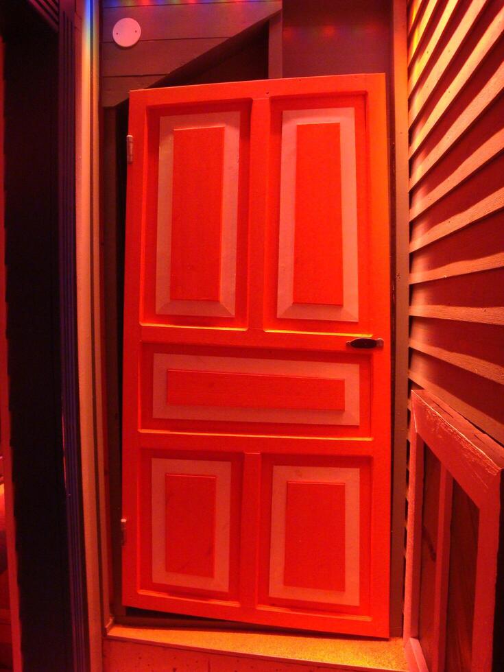 Colorful abstract doors and pumpkins during the Halloween period. photo