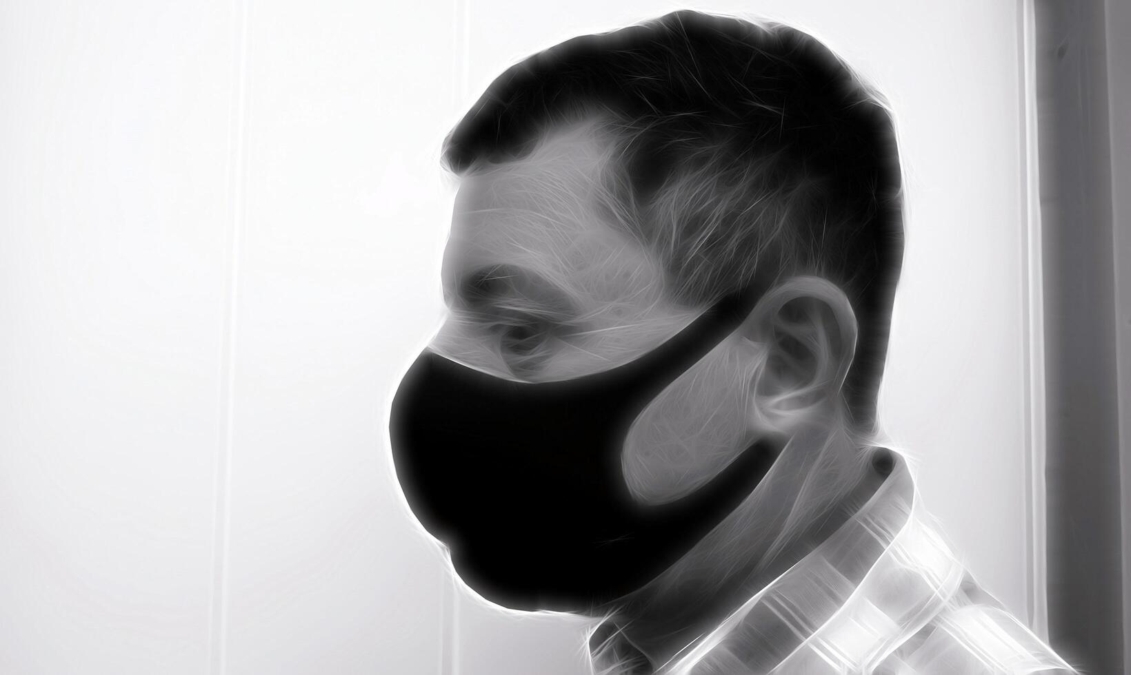 Digital Black and white painting style that portrays the face of a man with a black protective anti-contagion mask photo