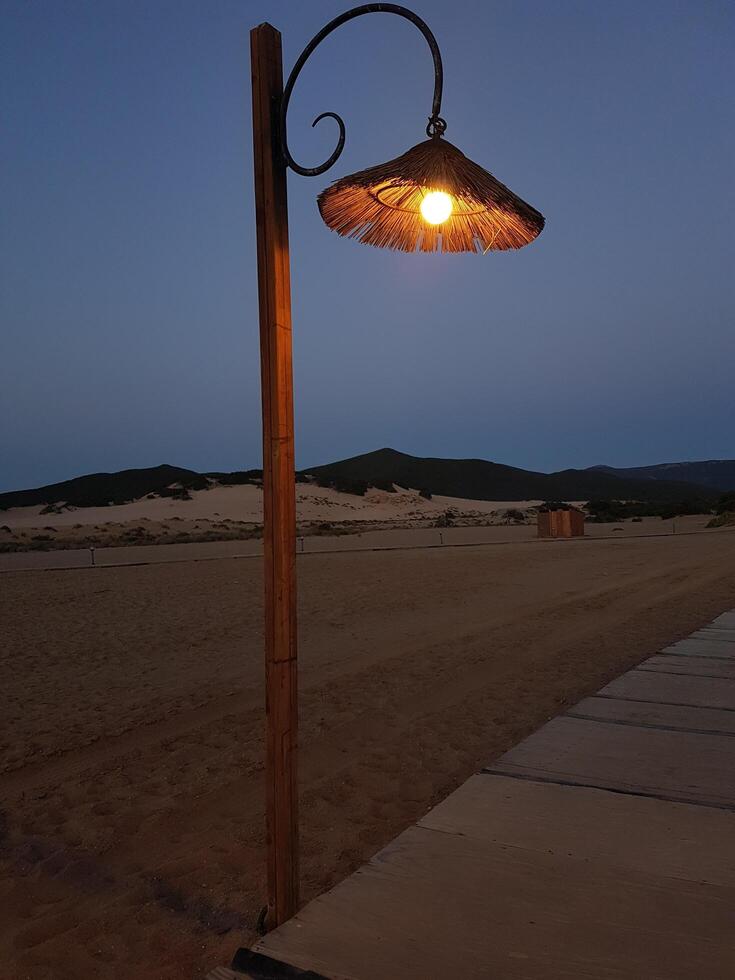 a lamp post on the beach avenue photo