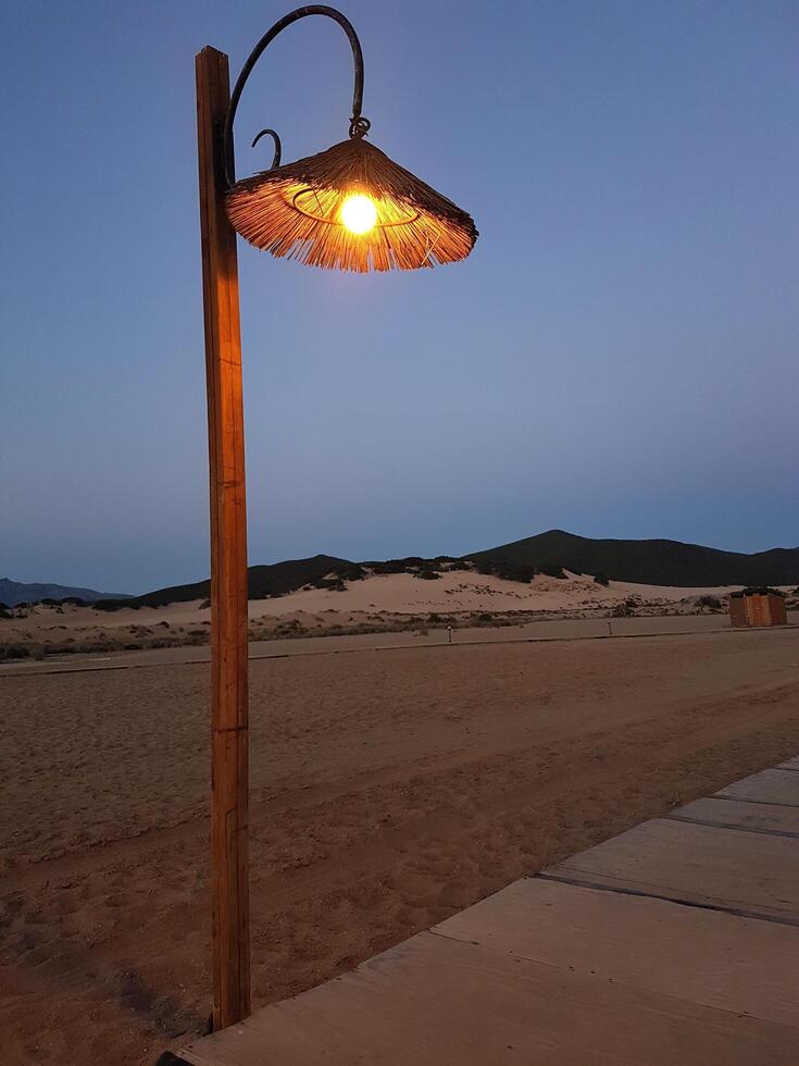 a lamp post on the beach avenue photo