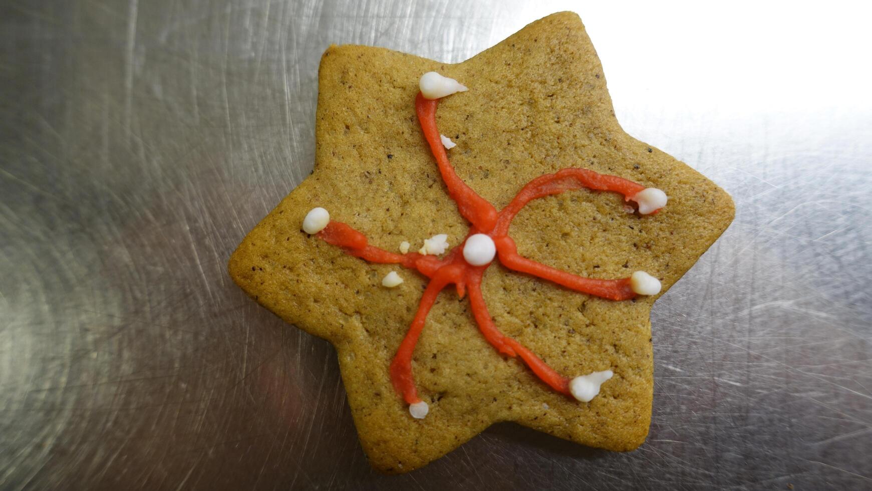 Colored star shaped ginger cookie photo