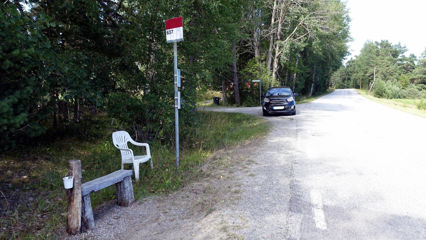 a bus stop in the countryside in Scandinavia photo