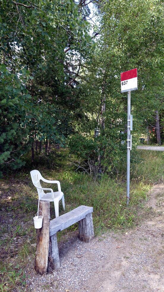 a bus stop in the countryside in Scandinavia photo