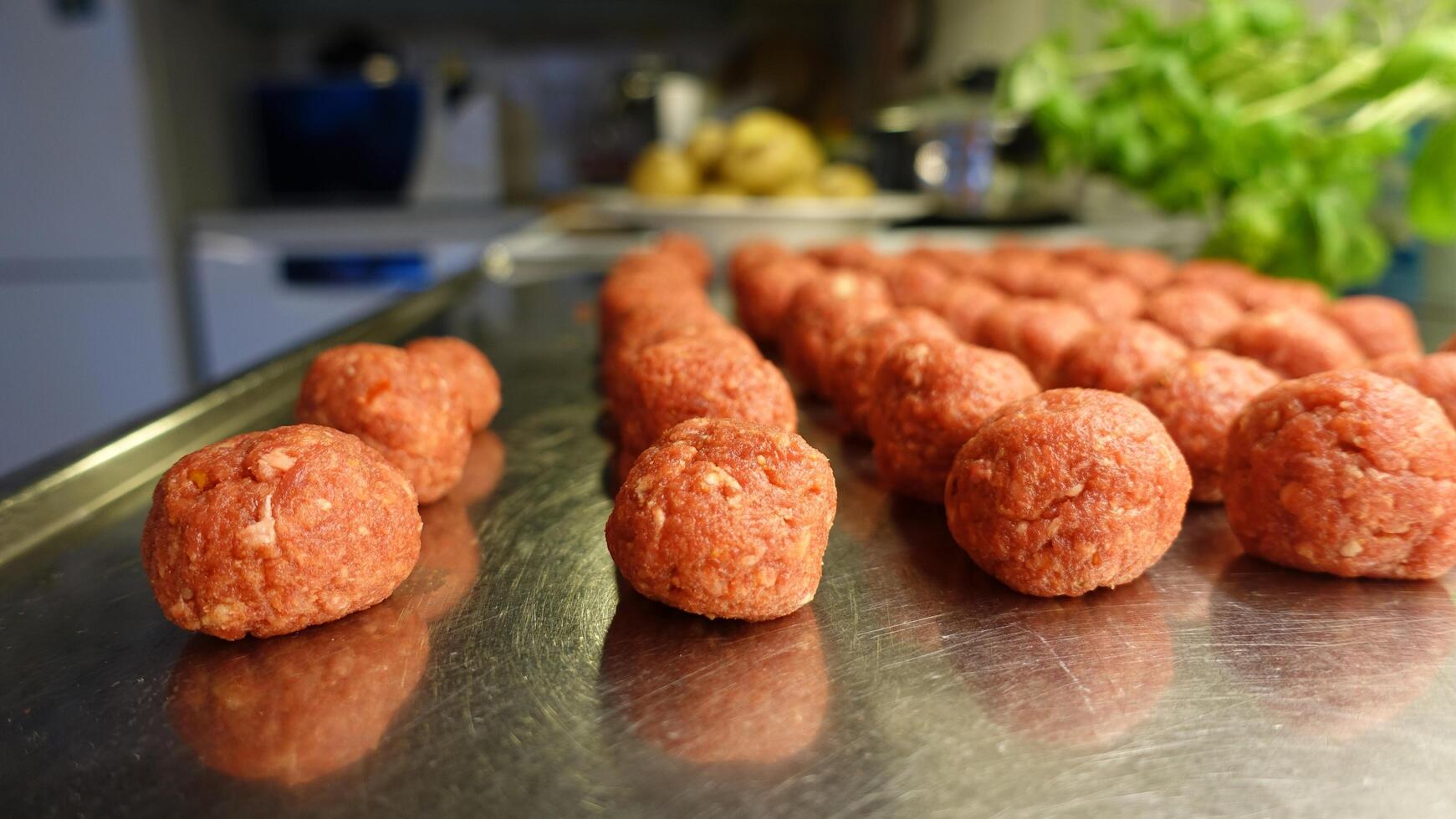 Homemade meatballs on the kitchen counter photo