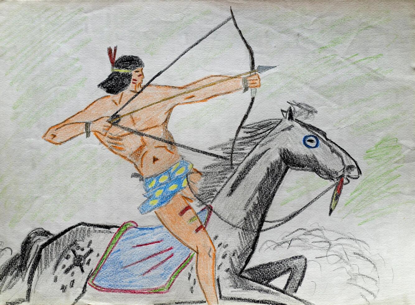 a Native American on horseback ready to shoot an arrow photo