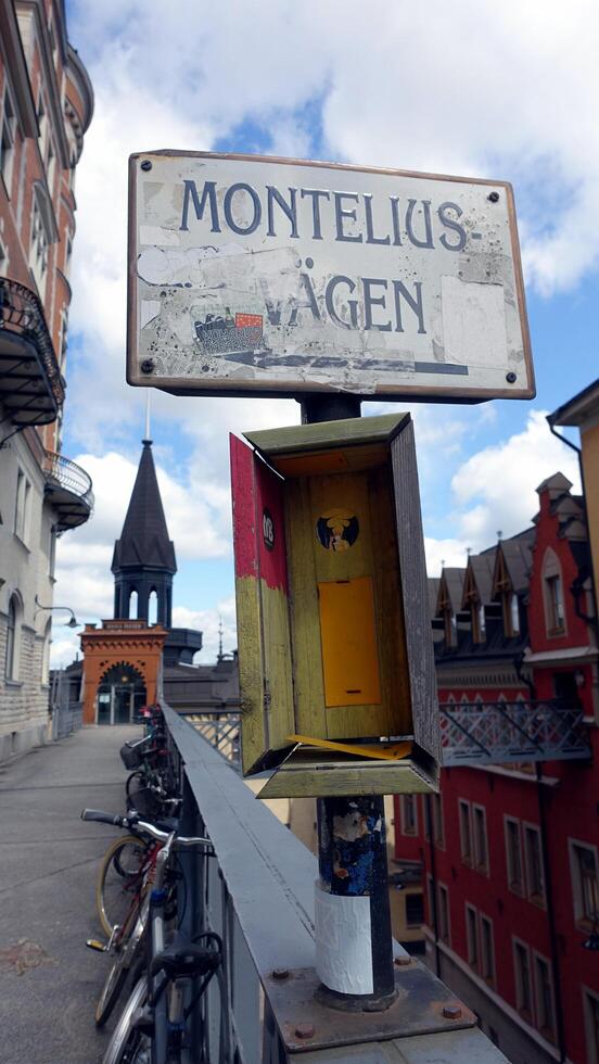 The signpost of a famous historic street in the center of Stockholm photo