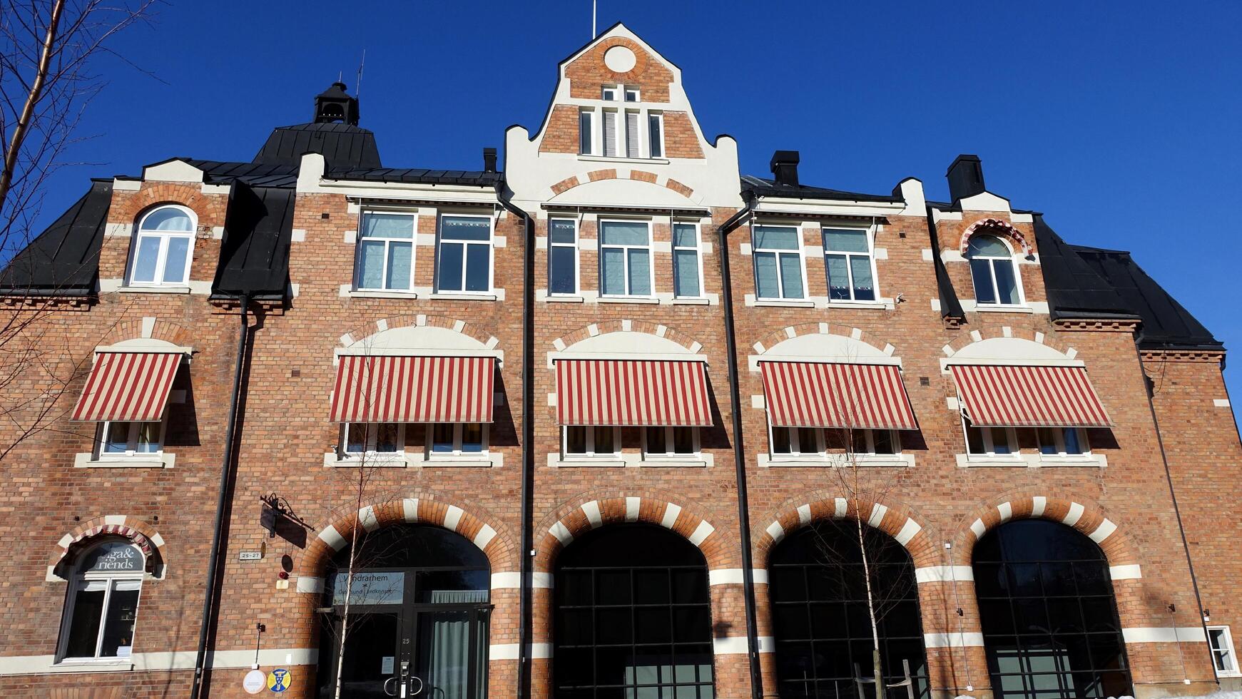Ostersund, Sweden, March 13, 2022 The facade of an historic building in the city center during this winter. photo