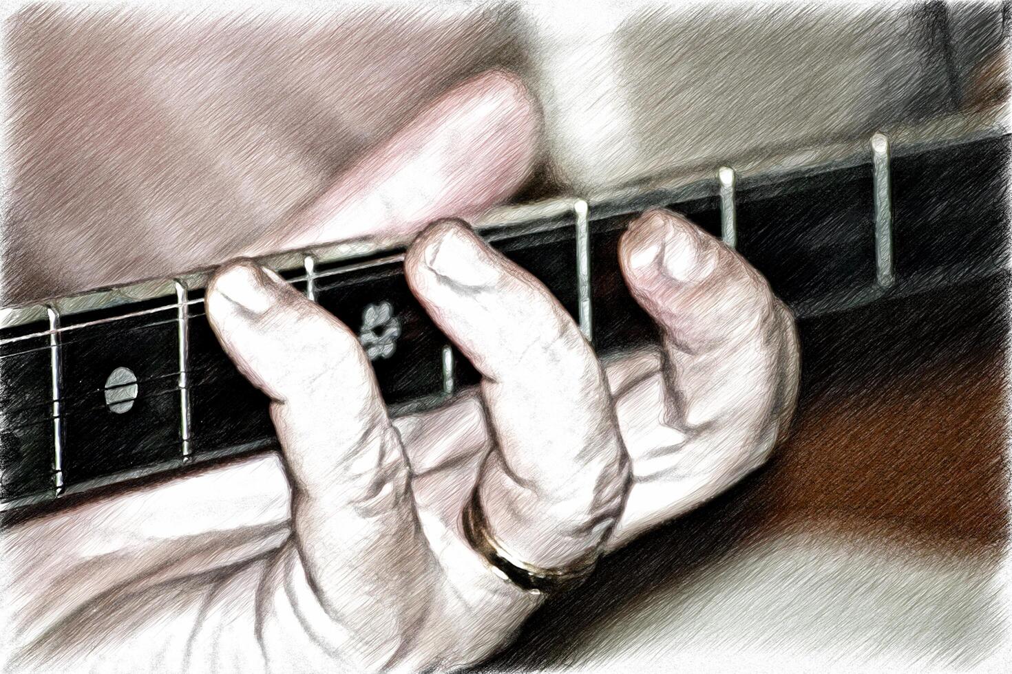 The fingers of the left hand slide over the metal strings on the neck of a bouzouki. photo