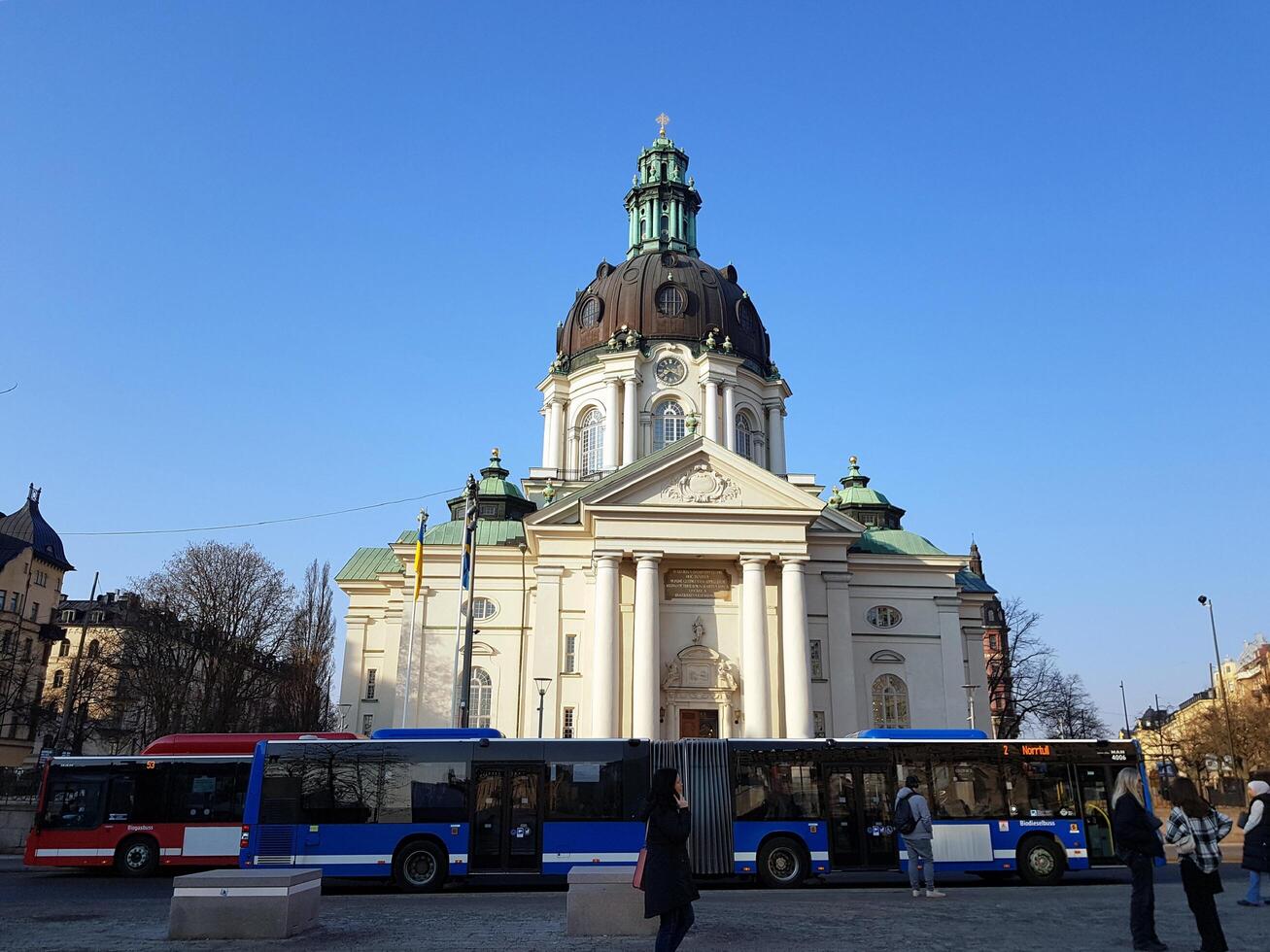 Stockholm, Sweden, 4 june 2022 A historic cathedral on one of the main squares in central Stockholm on a busy morning. photo