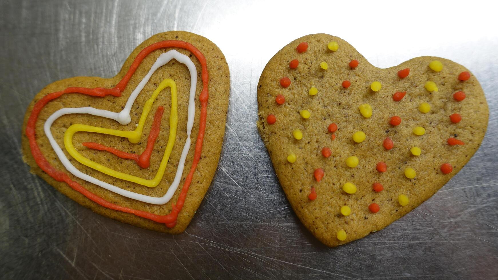 Ginger cookies decorated with colored hearts photo