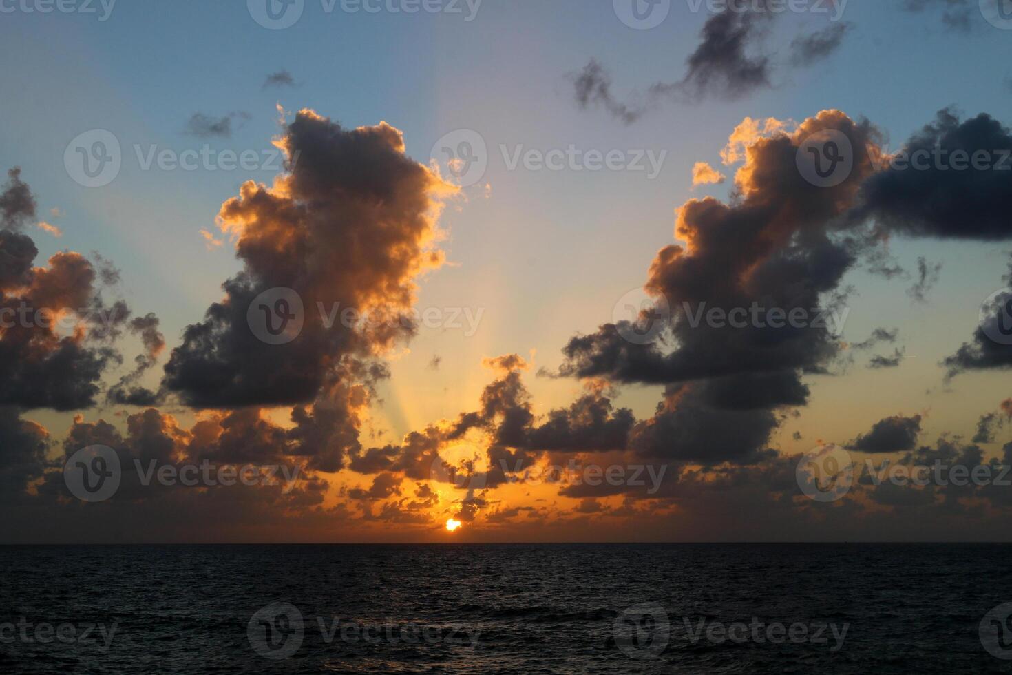Lighting and color of the sky above the horizon at sunset. photo