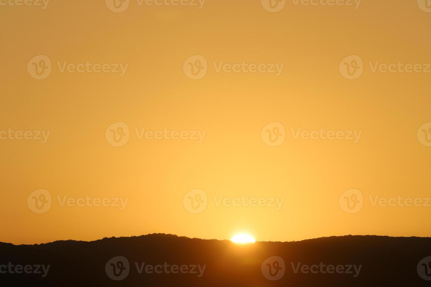 Lighting and color of the sky above the horizon at sunset. photo