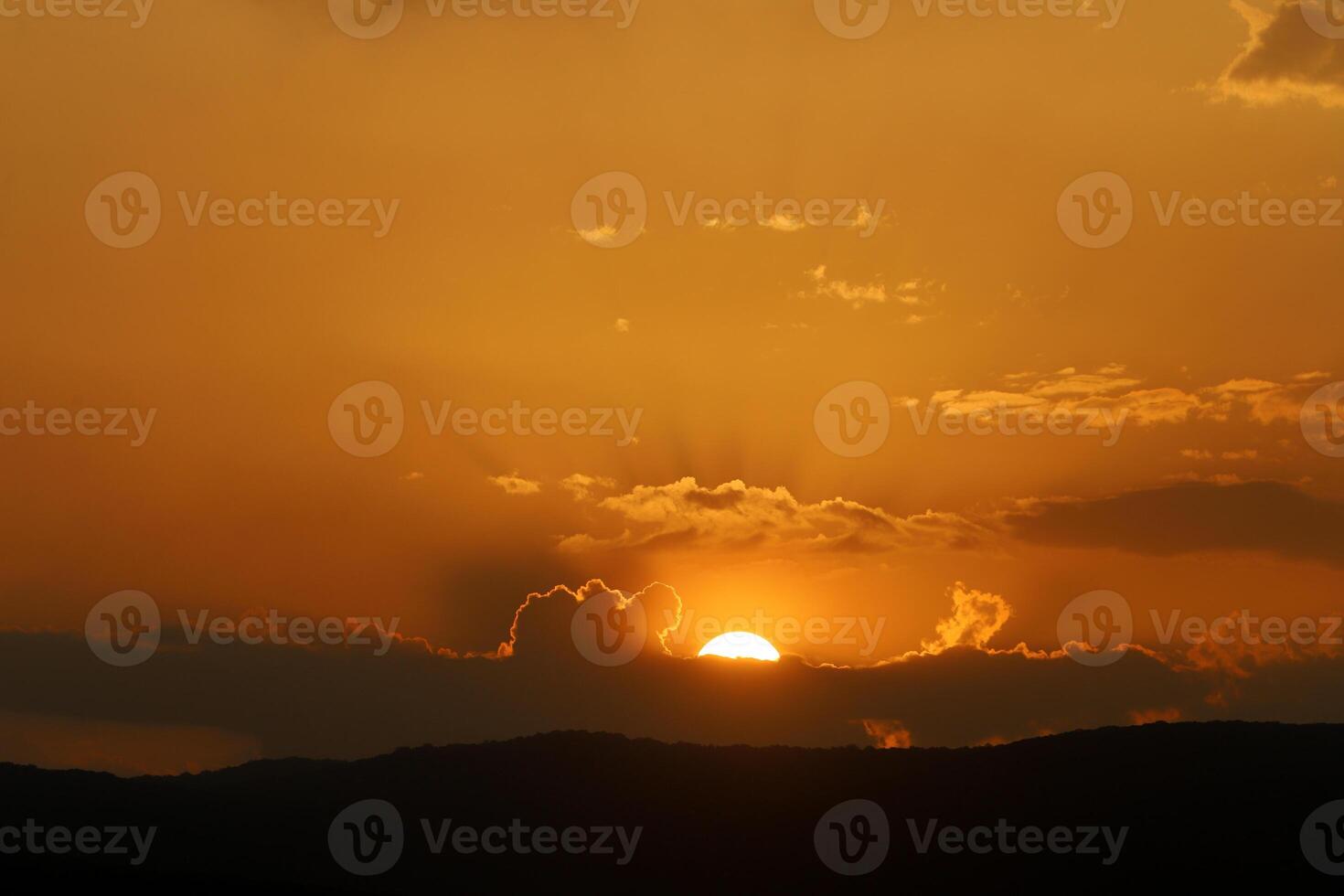 Lighting and color of the sky above the horizon at sunset. photo