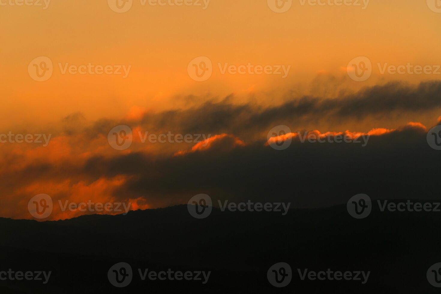 Lighting and color of the sky above the horizon at sunset. photo