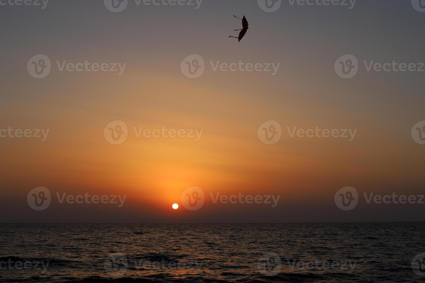 Lighting and color of the sky above the horizon at sunset. photo