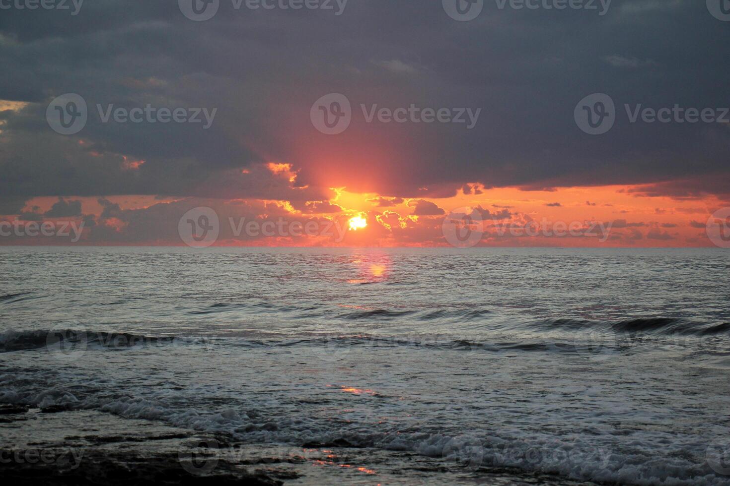 Lighting and color of the sky above the horizon at sunset. photo