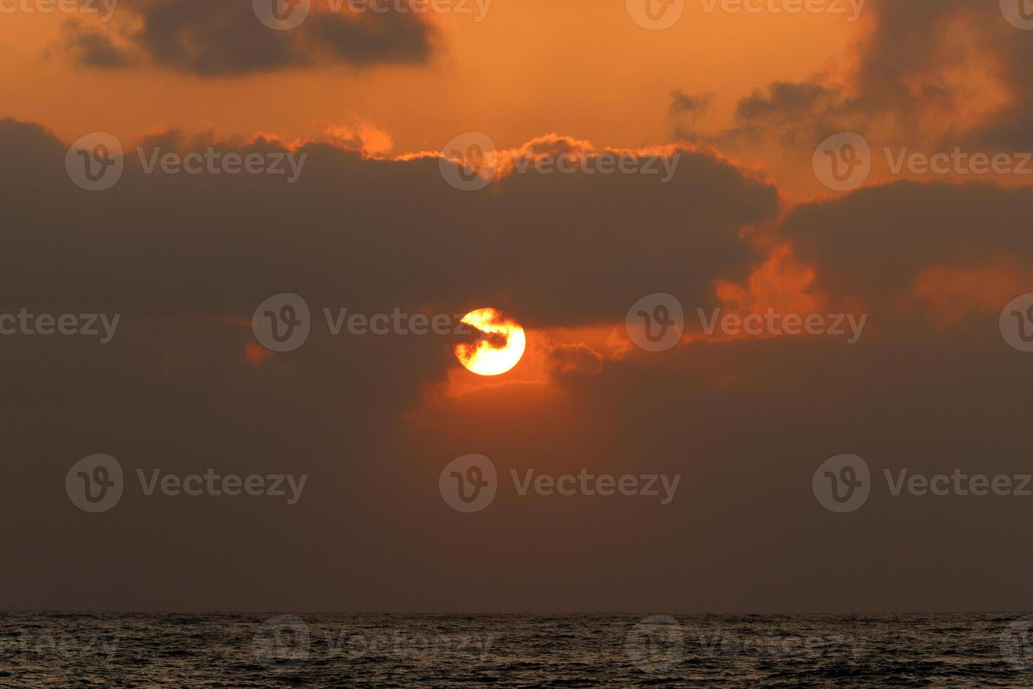 Lighting and color of the sky above the horizon at sunset. photo