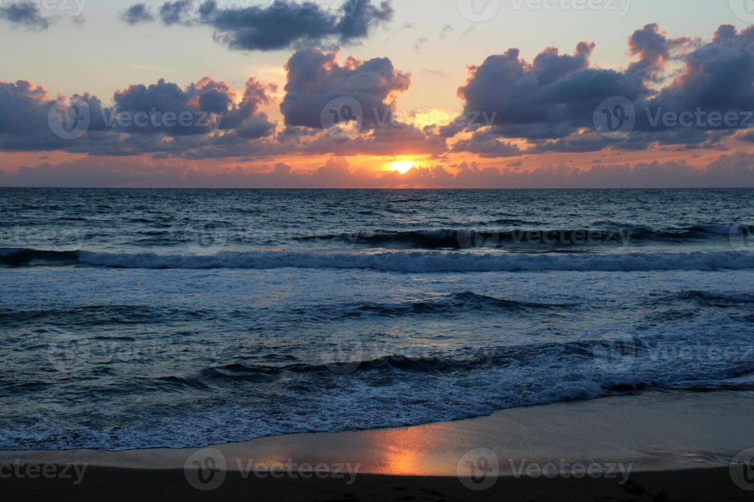 Lighting and color of the sky above the horizon at sunset. photo
