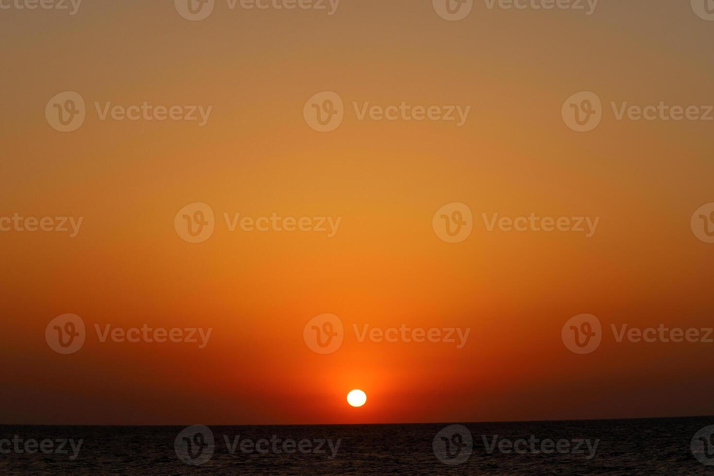 Lighting and color of the sky above the horizon at sunset. photo