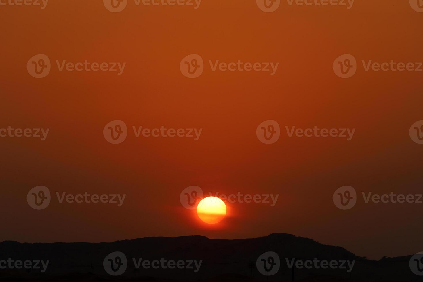 Lighting and color of the sky above the horizon at sunset. photo