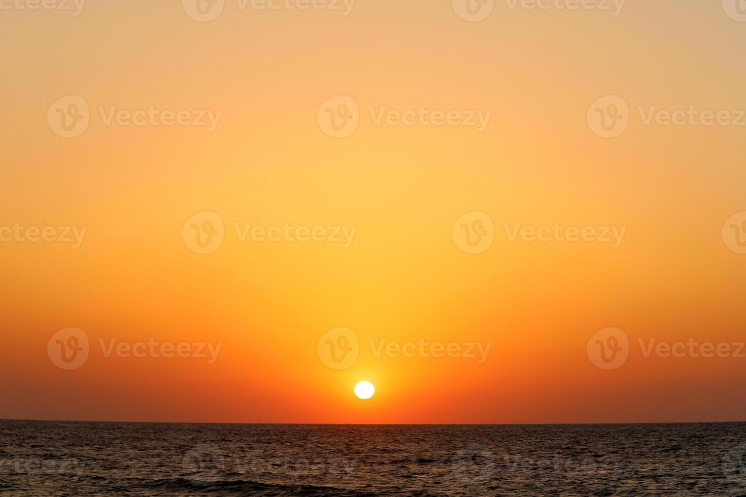 Lighting and color of the sky above the horizon at sunset. photo