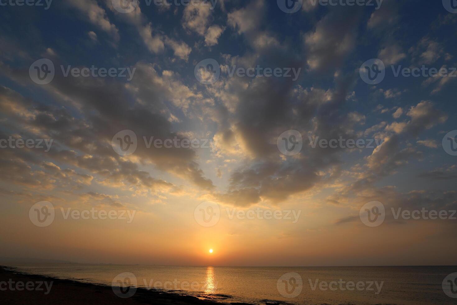 Lighting and color of the sky above the horizon at sunset. photo
