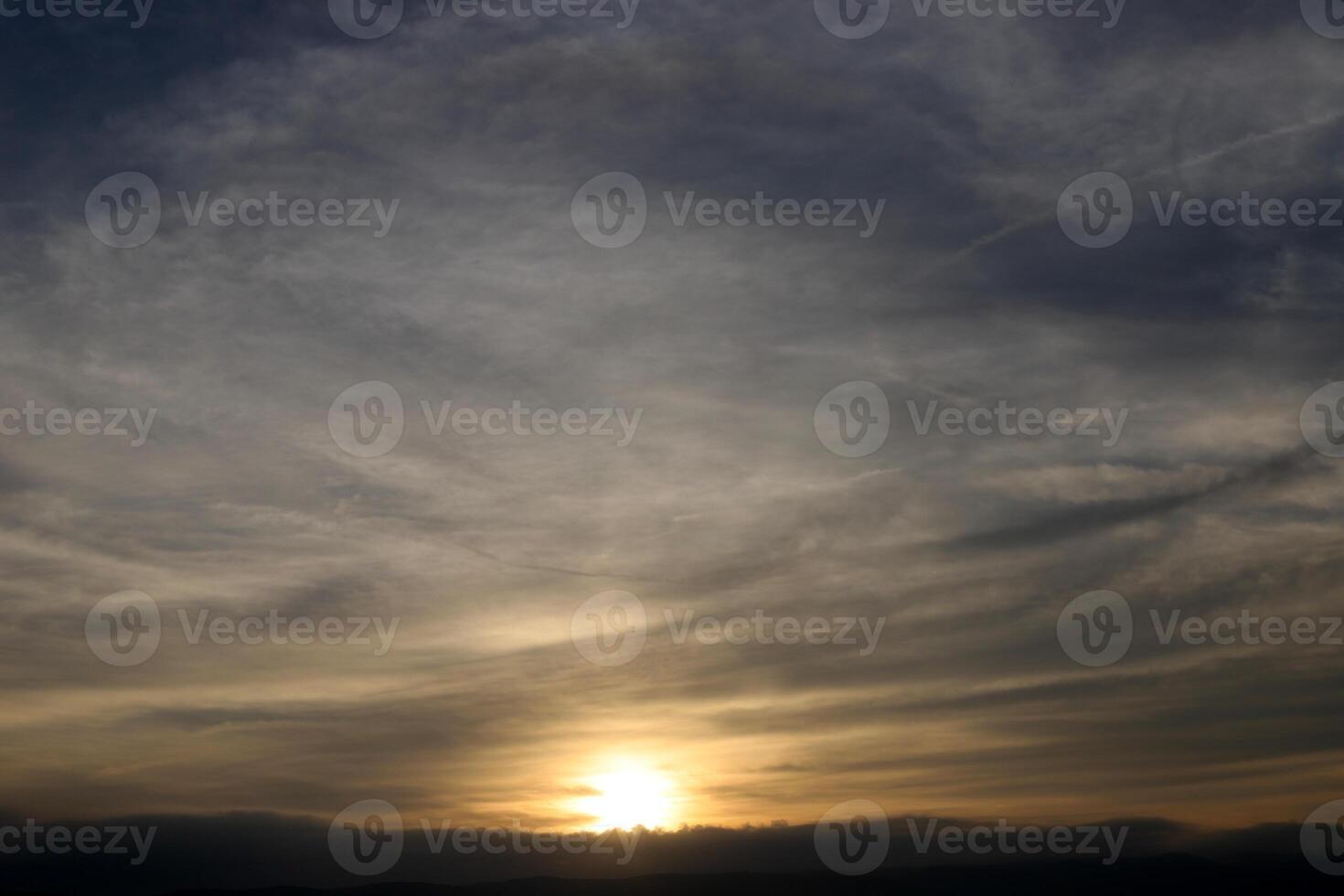 Lighting and color of the sky above the horizon at sunset. photo