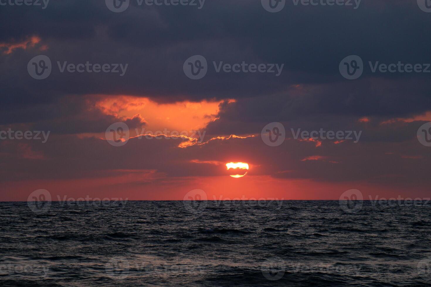 Lighting and color of the sky above the horizon at sunset. photo