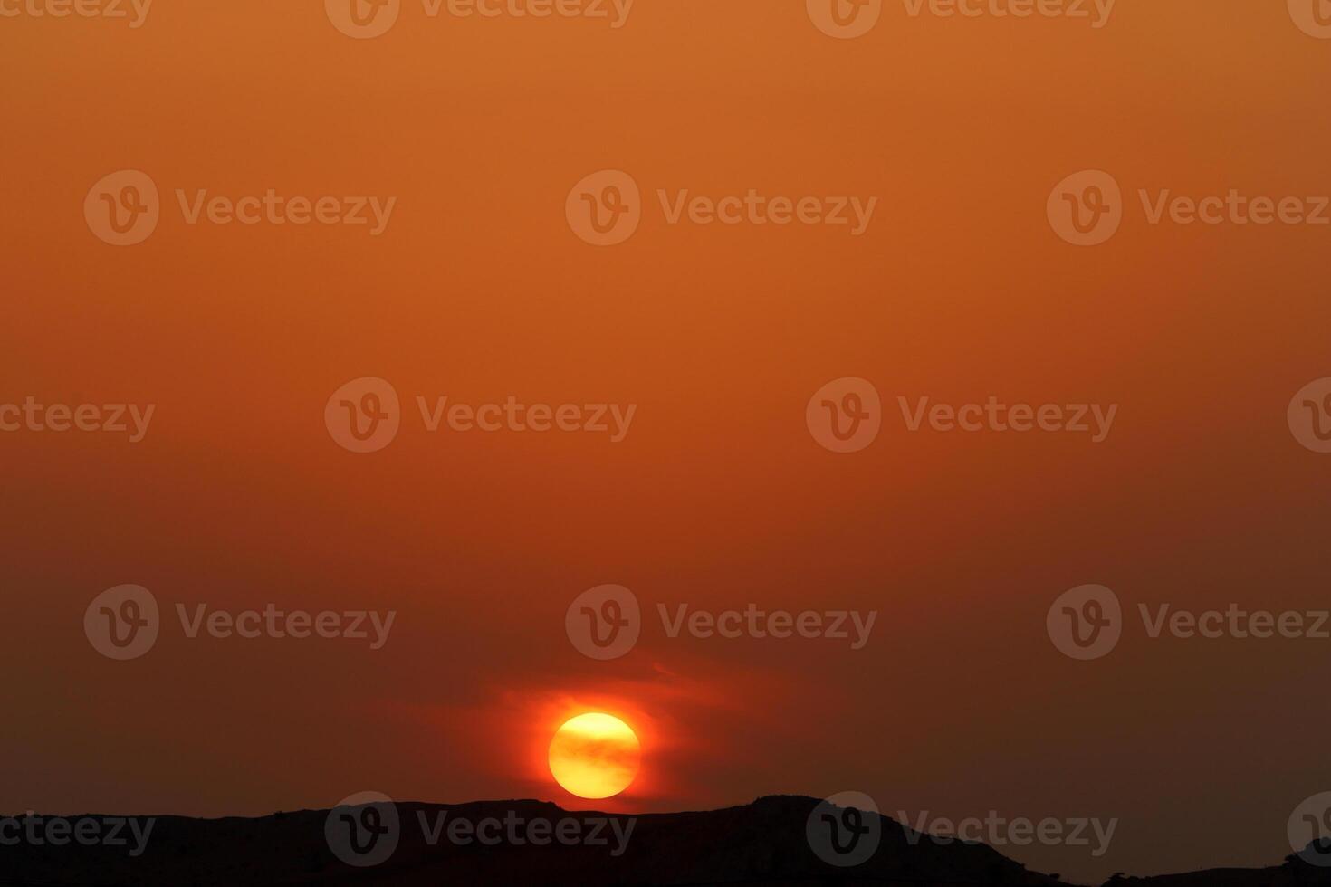 Lighting and color of the sky above the horizon at sunset. photo