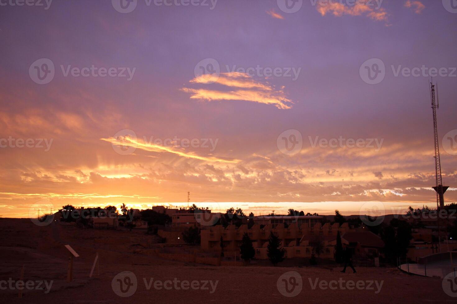 Lighting and color of the sky above the horizon at sunset. photo