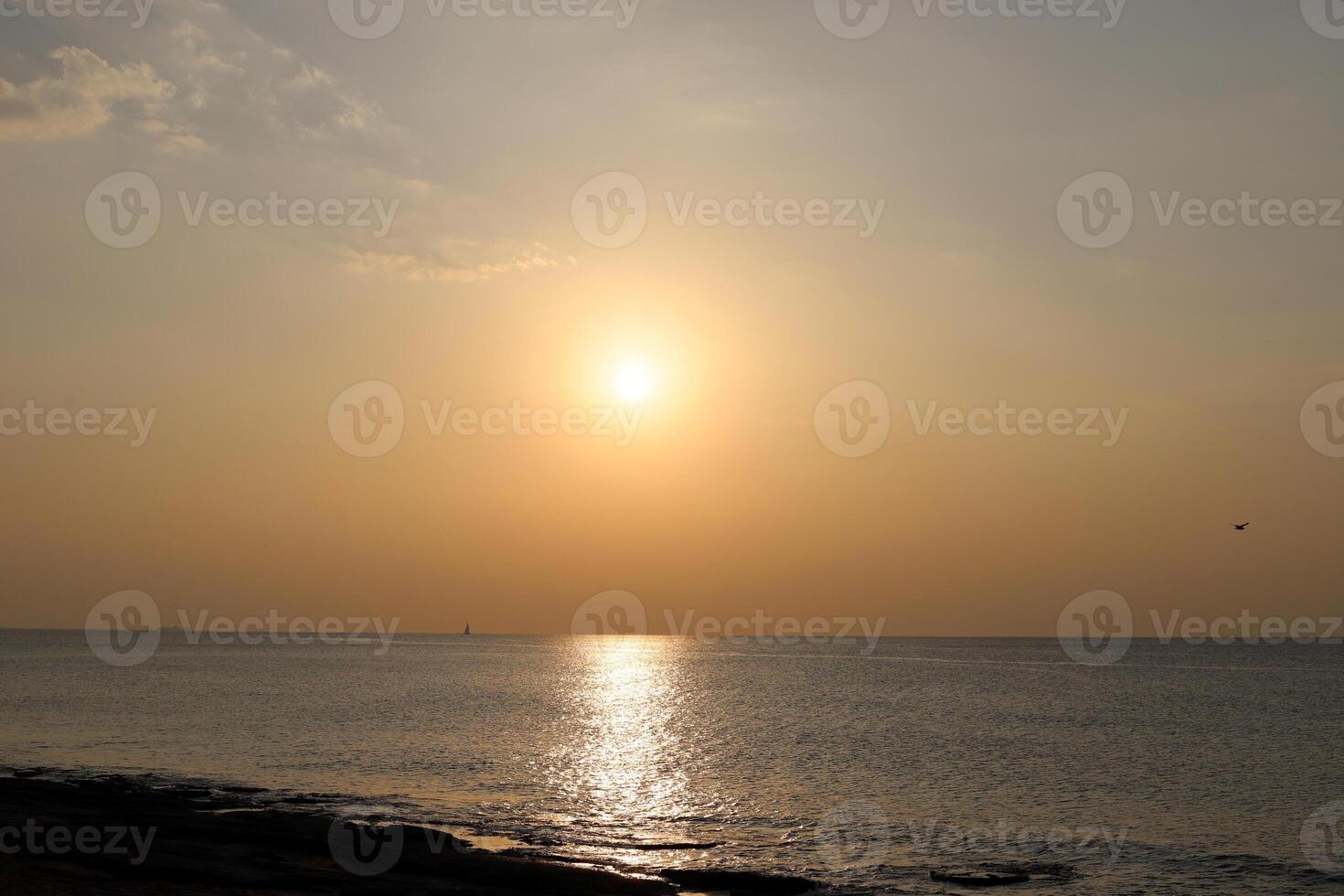 Lighting and color of the sky above the horizon at sunset. photo