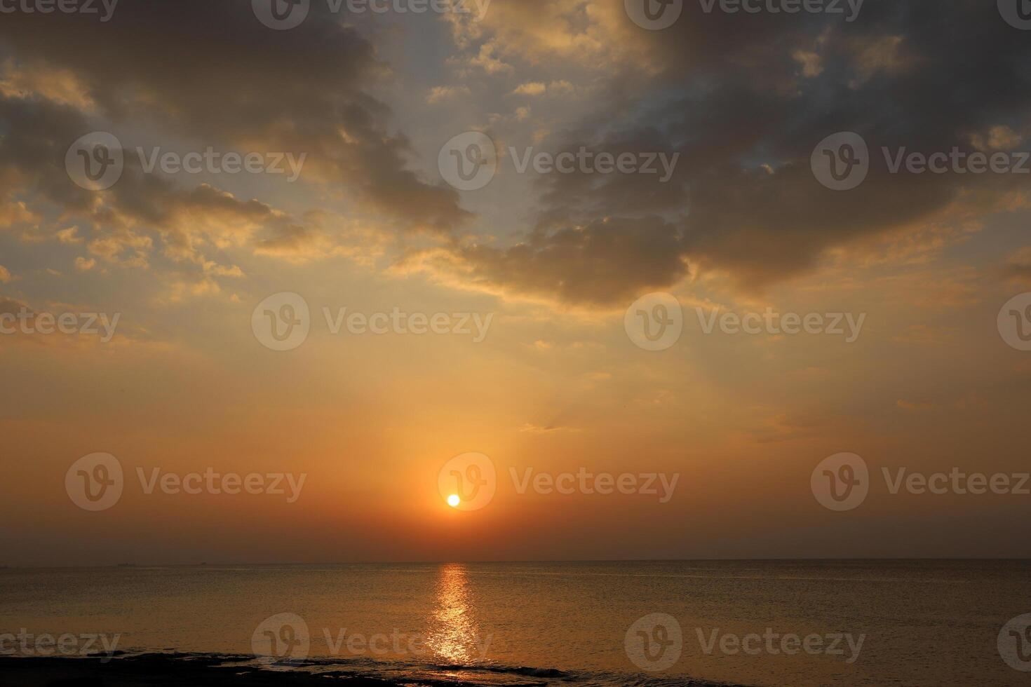 Lighting and color of the sky above the horizon at sunset. photo