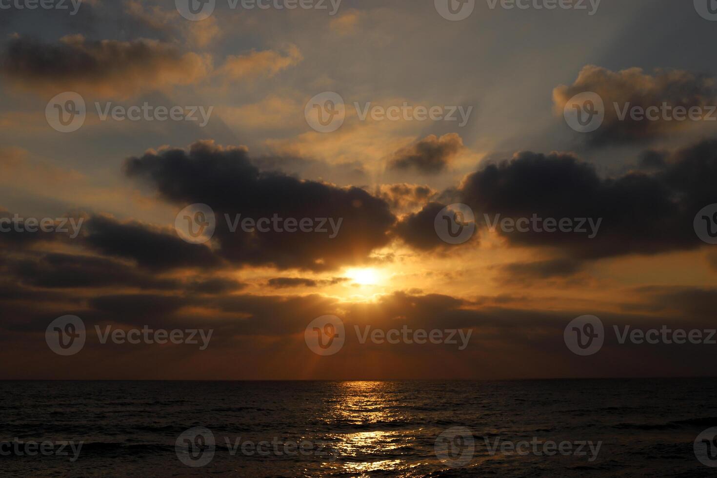 Lighting and color of the sky above the horizon at sunset. photo