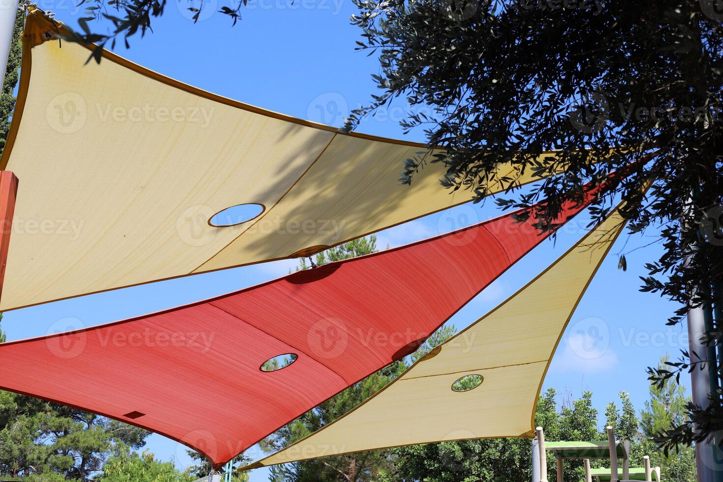 Canopy for protection from the hot sun in a city park. photo
