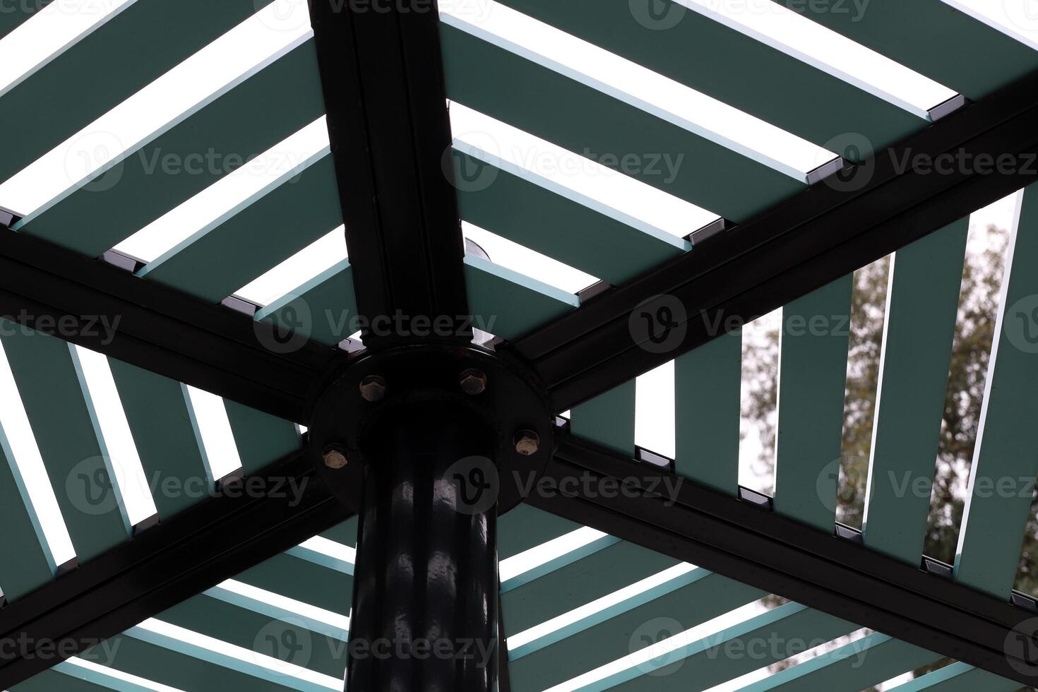 Canopy for protection from the hot sun in a city park. photo
