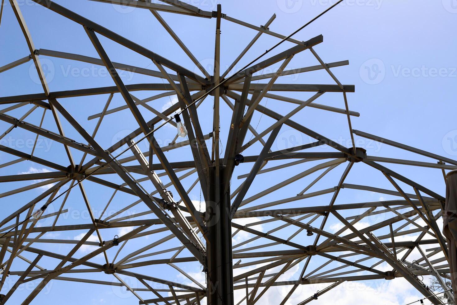 Canopy for protection from the hot sun in a city park. photo